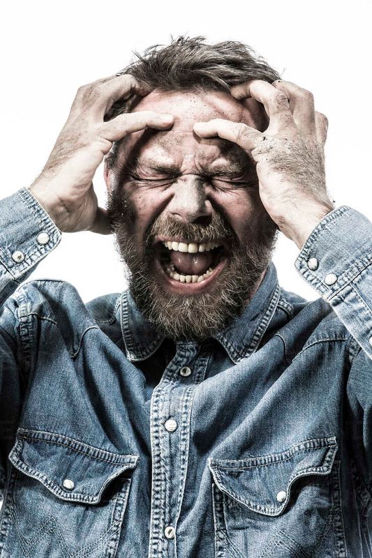 portrait-of-screaming-man-with-dirty-face-MAEF12190.jpg